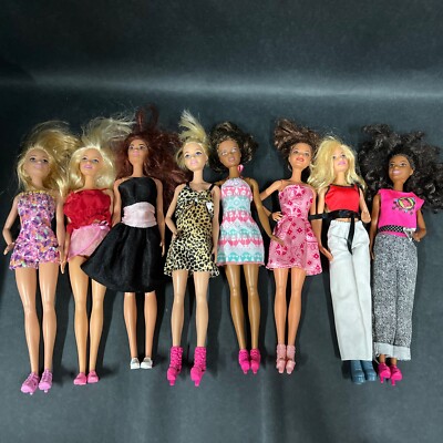 Lot Of Mattel Fashion Barbie Dolls in Various Styles Outfits