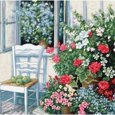 Blossom Haven Cross-Stitch Kit: Serene Terrace with Vibrant Flowers
