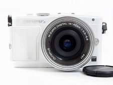 Olympus PEN Lite E-PL6 16MP Mirrorless Digital Camera with Standard Zoom Lens