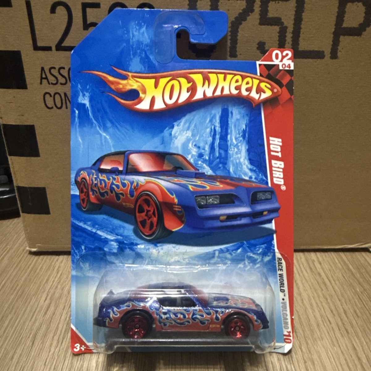 Hot Wheels 2010 Race World Volcano HOT BIRD 1977 Blue Flames