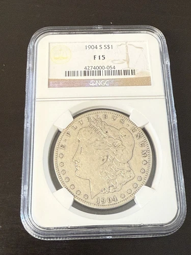 1904 S NGC F 15 Morgan Silver Dollar.