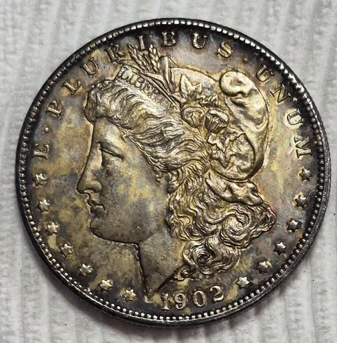 1902 O Morgan Silver Dollar. Toner! Estimated Uncirculated Mint State 62/3. A511