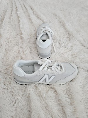 New Balance 515 sneakers in white, featuring a metallic silver Size 13