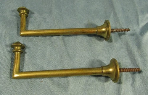 Pair of Bronze or Brass Curtain Kisses