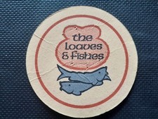 The Loafes And Fishes Restaurant Beer Mat.  Suffolk.