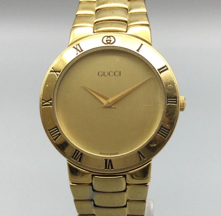 Montre vintage Gucci 3300M homme 33 mm cadran ton or pile neuve 7
