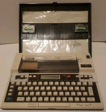 Vintage Sears 300 Typewriter. Portable Typewriter with Case, Cord, and Bag thumbnail