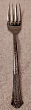 INTERNATIONAL SILVER SILCO INS104 GLOSSY STAINLESS FLATWARE FLORAL CENTER CHOICE