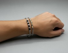 Bracciali Semi-Rigidi da Uomo in Argento 915 – Design Moderno a Cavi Intrecciati