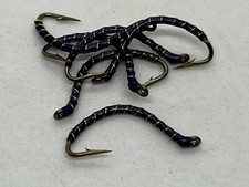  6ea. Purple Pig Stickers size #10. A must have for your flybox.