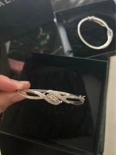 Zales 1/5 CT Diamond Three Stone Bypass Ribbon Bangle Sterling