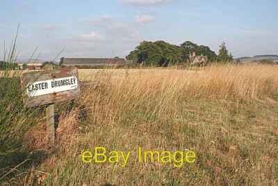 Photo 6x4 Easter Drumgley The farm buildings stand among the trees in the c2006