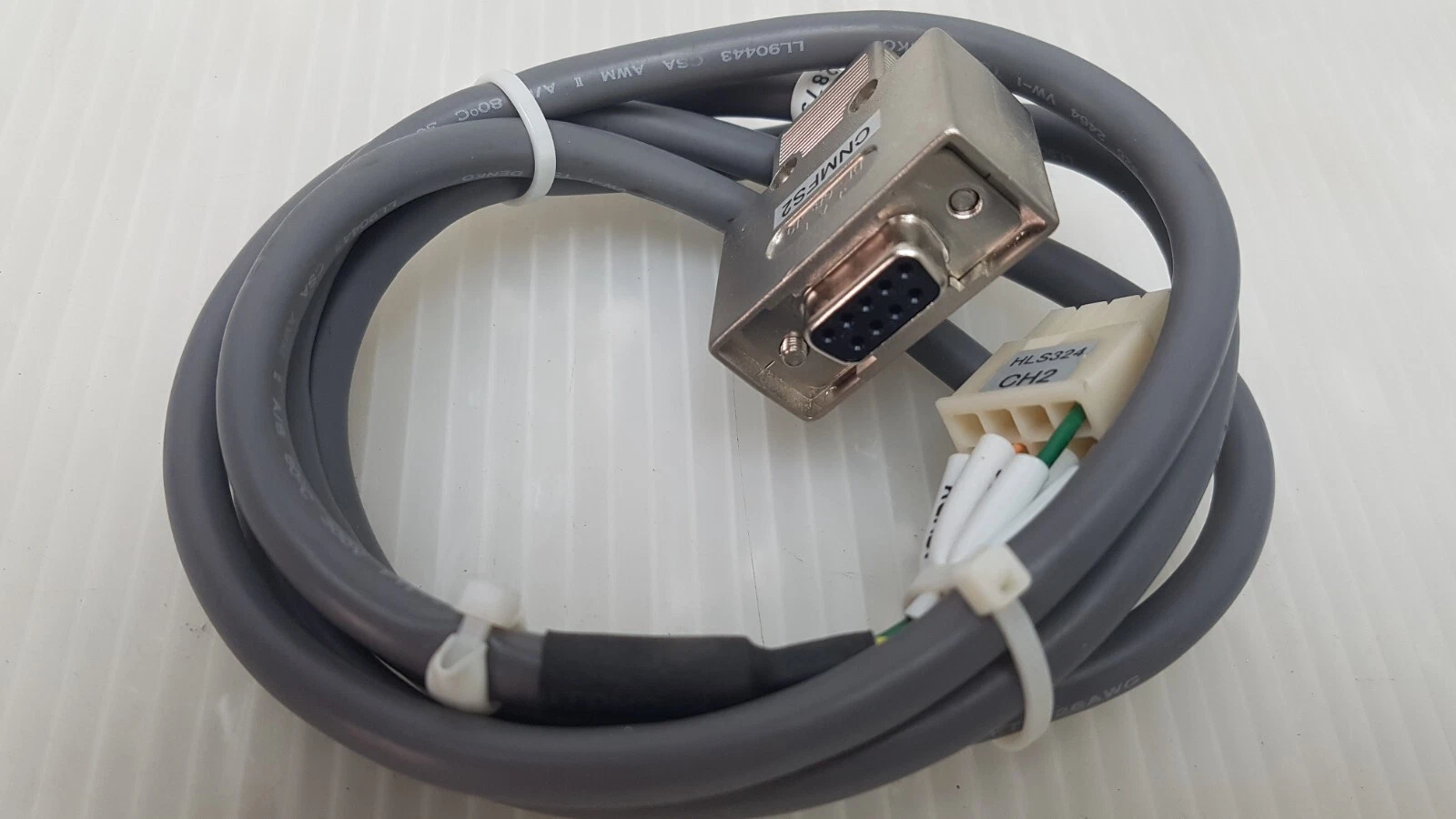 Grey cable with 9-pin D-sub plug shown with the LINTEC MC-2300