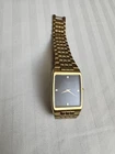 Seiko Black Dial Gold Tone Rectangle V700-5001 New Battery Men’s Watch