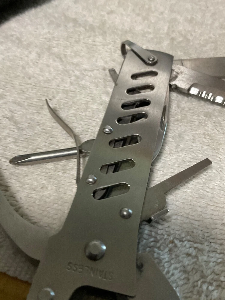 MULTI-TOOL WITH HOLDER. STAINLESS