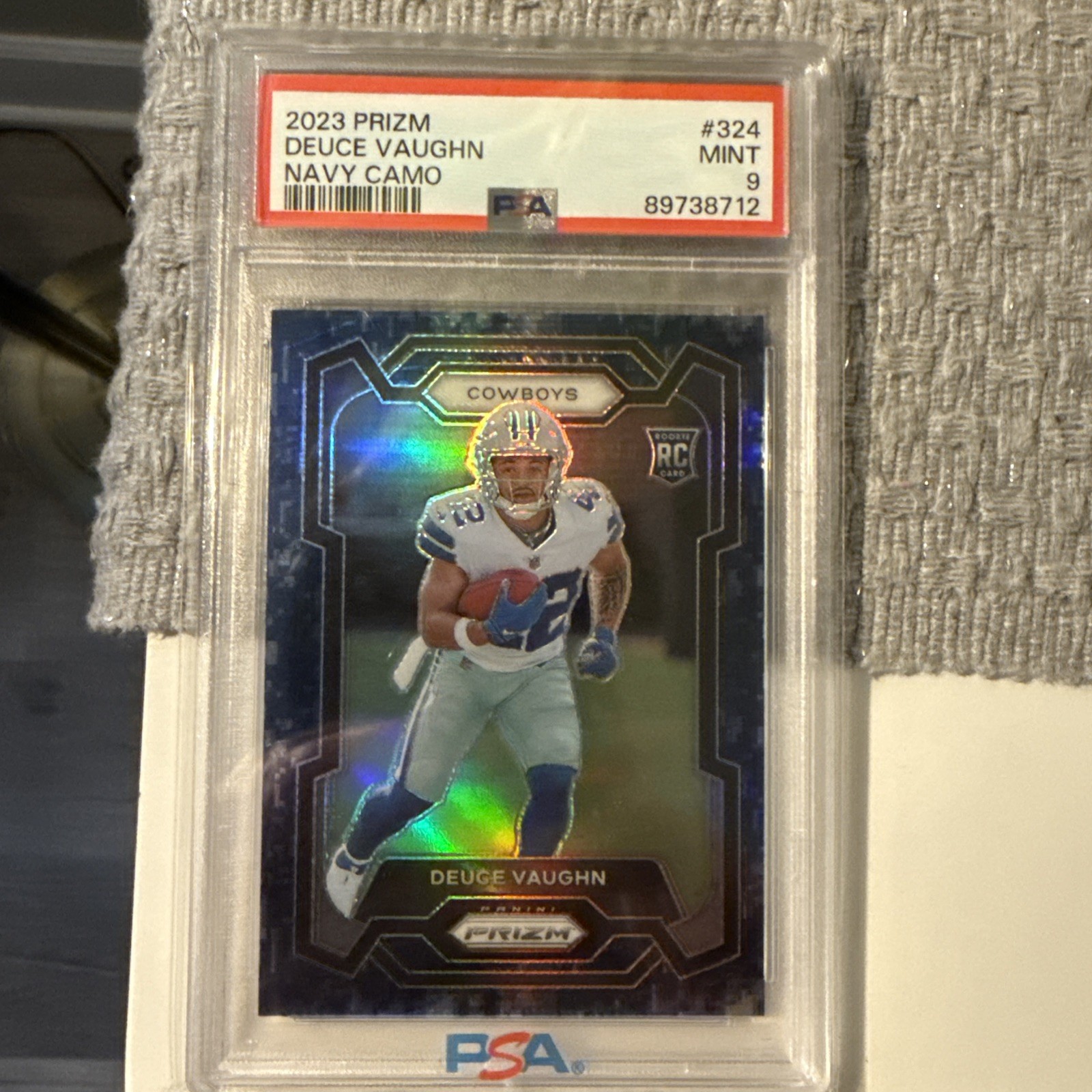 2023 Panini Prizm Prizms Navy Camo #324 Deuce Vaughn /25