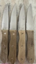 4 stainless steel w riveted wood handle steak knives serrated edge