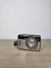 Nikon COOLPIX S01 Digital Camera 10.1 MP Mirrored Silver Chrome 7.3 GB Memory