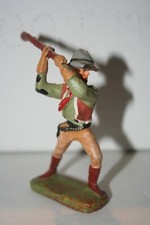 ELASTOLIN Composite Cowboy swinging rifle overhead. German Figure- Broken Hat