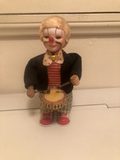 Vintage wind-up drumming clown