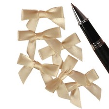 Mini Ivory Satin Bows - 1 3/8 in. x 1in. - 50 Pack 601352 
