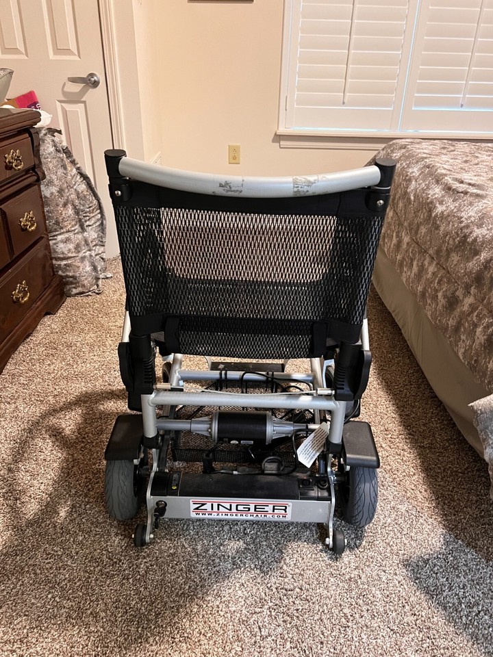 Journy Zinger folding power wheelchair twohanded control gently used