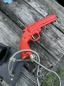 Vintage Nintendo Playchoice 10 Arcade Game Gun Revolver  Orange W/ Chain