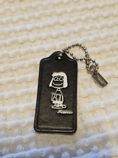 NWOT COACH x PEANUTS Marcie With Book 1st edition Hang Tag Key Chain Bag Charm