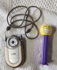 Coby CX-7: Mini AM FM Pocket Radio Dynamic Bass Boost System Neck Strap WORKS