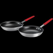 Juego de sartenes antiadherentes Tramontina de 10” 2 piezas mango rojo aluminio NUEVO