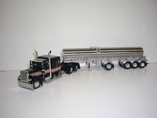 DCP FIRST GEAR 1/64 PETERBILT 379 WITH SLEEPER AND QUAD AXLE WALKER MILK TANKER