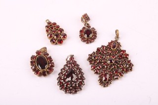 Vintage Garnet Pendants and one halo pendant in low carat gold x5 12.09g