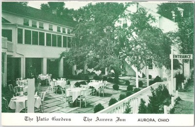 The Patio Gardens At The Aurora Inn Outdoor Dining Scene