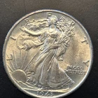 1943 Walking Liberty silver half dollar.AU/UNC