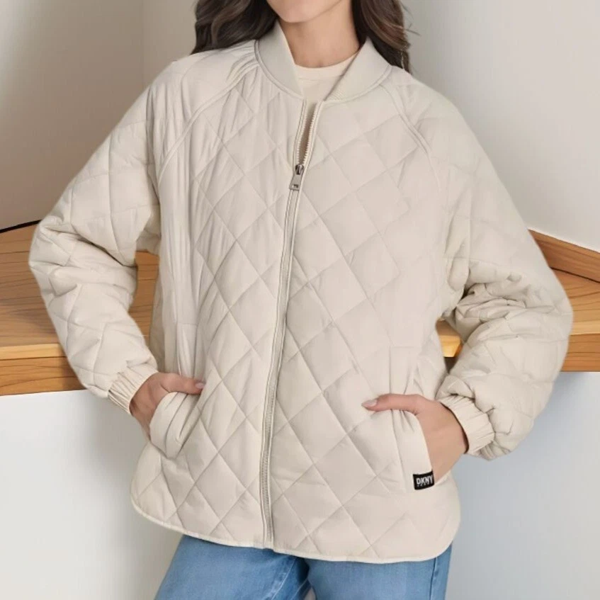 Chaqueta acolchada de bombardero acanalada delantera con cremallera Dkny para mujer color caqui claro talla S nueva con etiquetas Foto 2 de 4