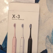 X-3 Electric Toothbrush. Black With 8 Replacement Heads And Charger