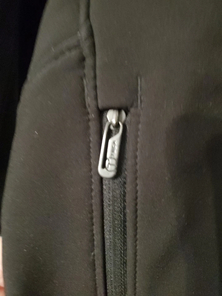 Chaqueta Tumi Forrada de Vellón Cremallera Completa Negra Hombres XL Abrigo de Invierno Negro Bolsillos Viaje  Foto 4 de 4