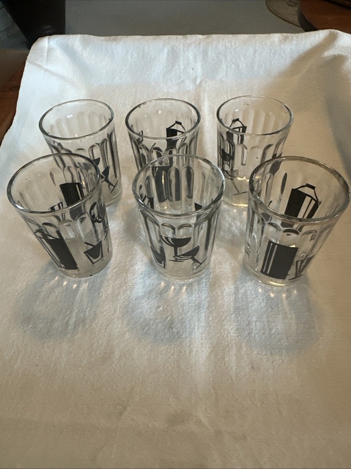 Mid-century modern silhouette-print shot glasses with genuine MCM graphic flair — the kind of barware that sparks a conversation.
