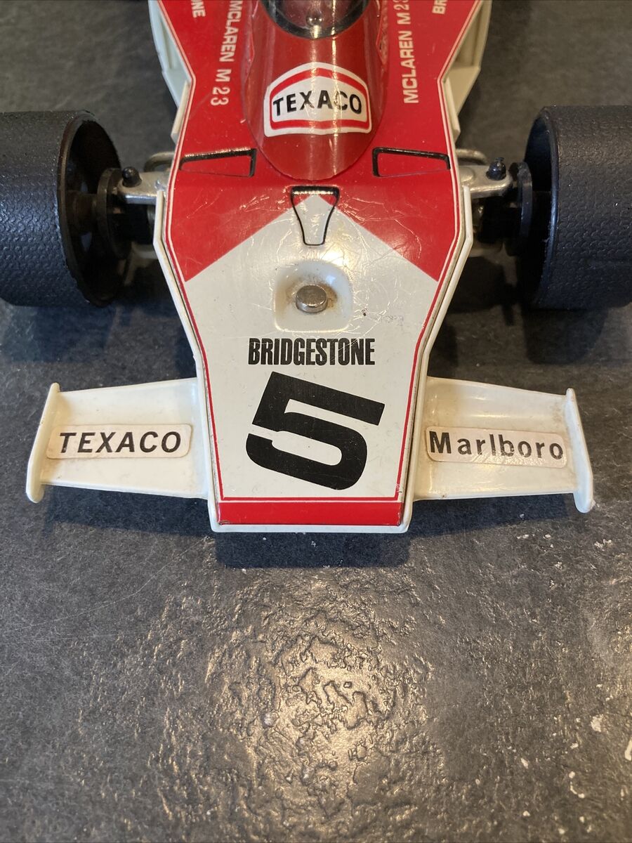 Texaco Marlboro Bridgestone Mclaren M23 Vintage Battery Texaco Marlboro Bridgestone Mclaren M23 Vintage Battery