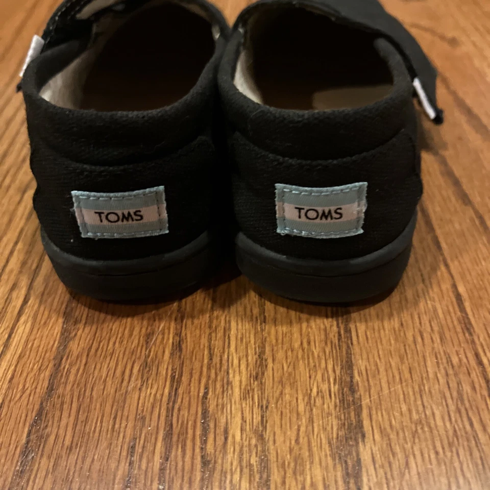 Zapatos sin cordones acolchados de lona de alpargata TOMS para niños pequeños talla 10T negros unisex Foto 4 de 4
