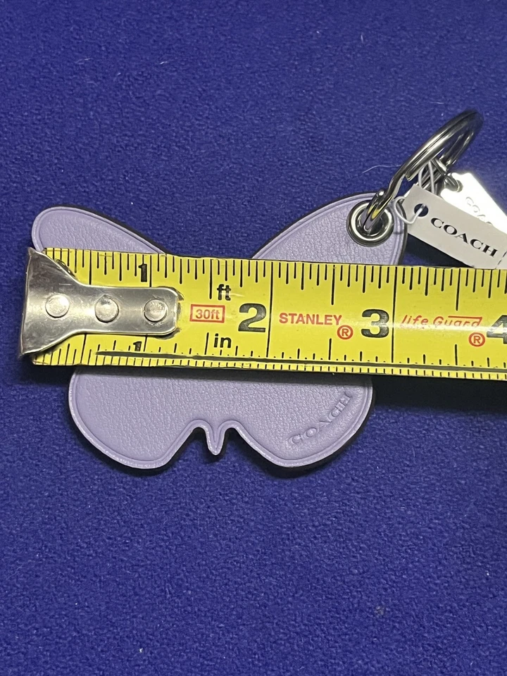 NUEVO CON ETIQUETAS Coach Bolso Mariposa Dije Llavero Plata/Violeta Claro CR903 Foto 3 de 4