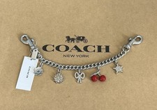 NWT COACH Chain Bag Charm Crystal Motif Bow Cherry Flower Silver Multi CCX42
