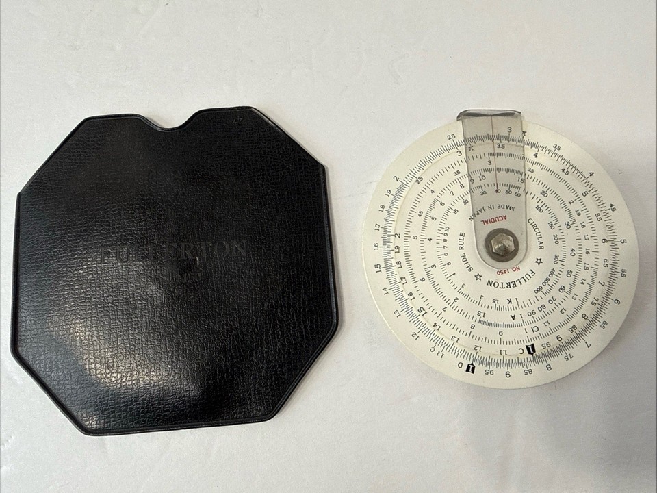 A circular slide rule — because apparently engineers once used a SPINNING DISC to do logarithmic math, and it's gorgeous.