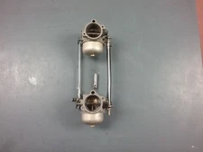 Set of carburetors from a 1984 90 HP Chrysler outboard motor WE6