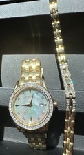 Citizen Eco-Drive Women s Gold Tone MOP Dial Diamond Markers Date w/Box