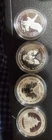 Four different 1 oz of Proof Silver Coins