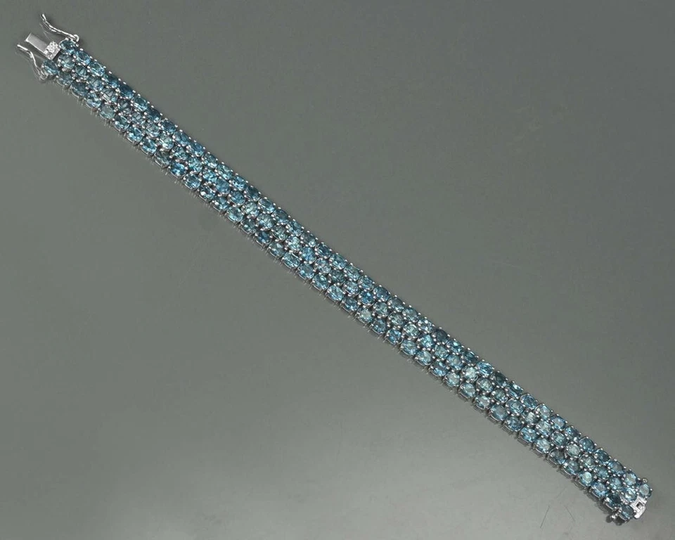Pulsera tenis de plata de ley 925 con piedras preciosas ovaladas de topacio azul de Londres regalo para ella Foto 4 de 4