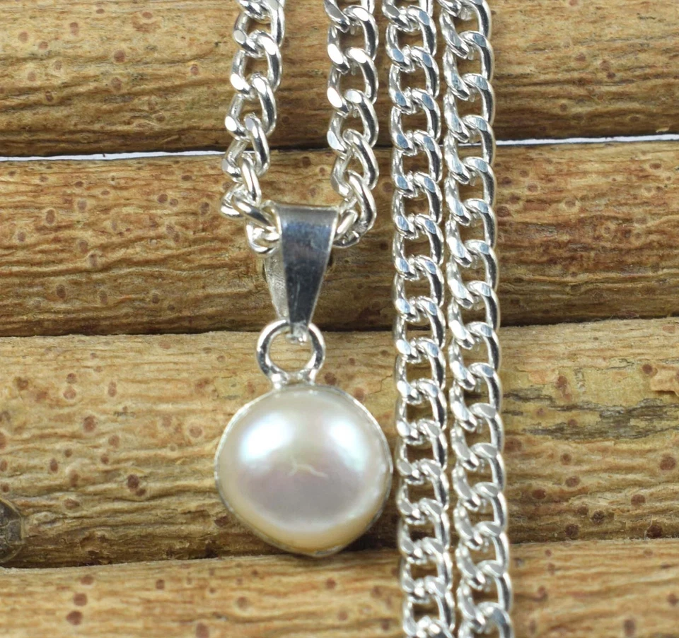 Colgante de piedras preciosas redondas de 5 quilates con perlas blancas naturales del Mar del Sur VER VDO Foto 2 de 4