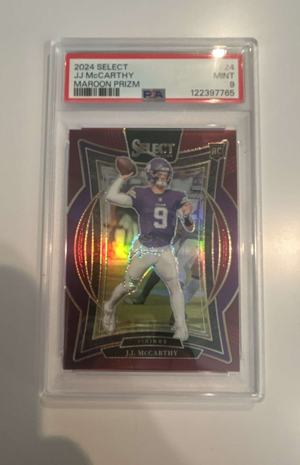 2024 Panini Select - Concourse J.J. McCarthy #24 Maroon Prizm /149 (RC)