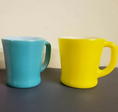 2 FIRE KING D HANDLE MUGS TEAL, YELLOW FIRED ON ANCHOR HOCKING 